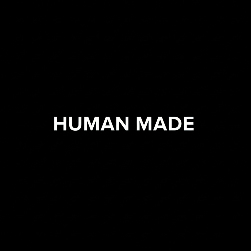 Human Made wordmark in white on black square background, monochrome Japanese streetwear brand plate