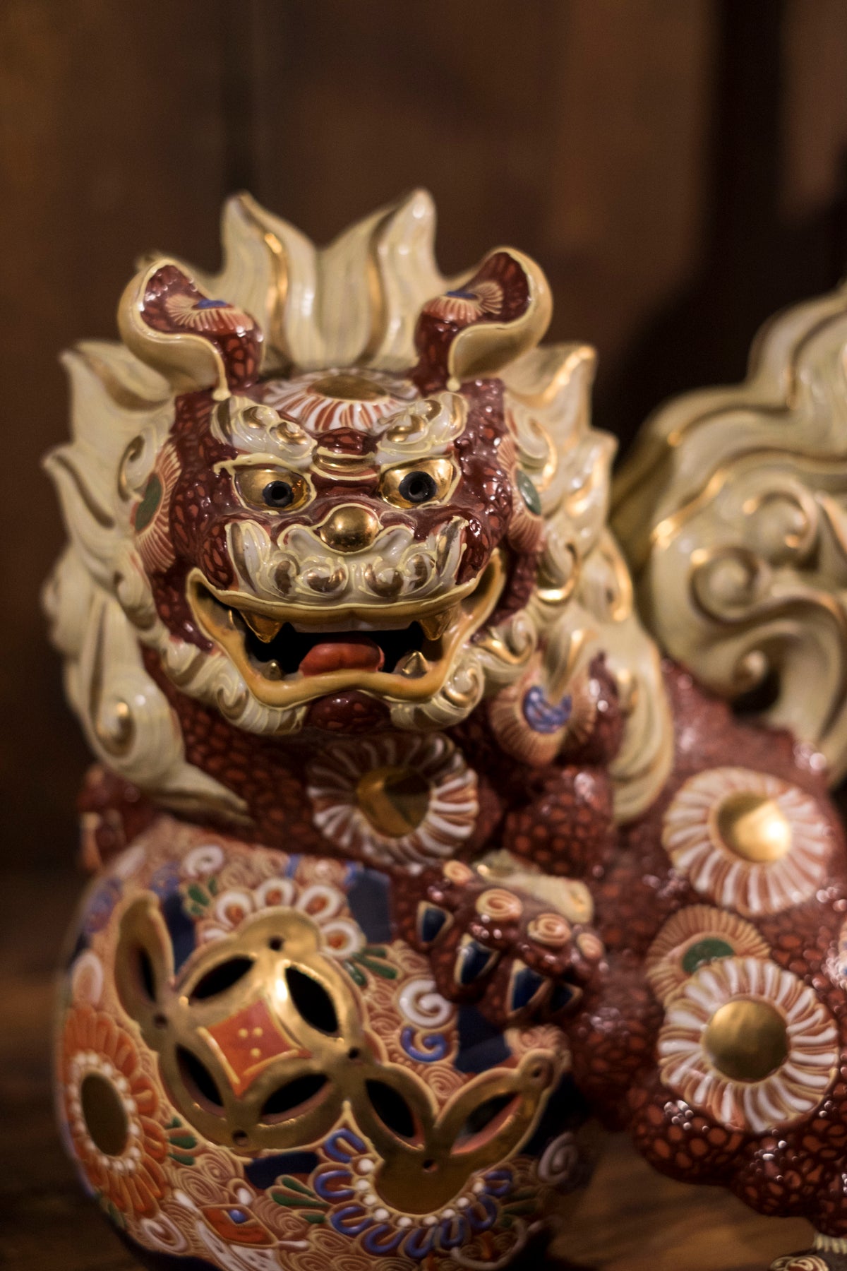 Vintage Japanese Kutani Shishi Guardian Lion Pair with Pierced Brocade Balls | Red Gold Moriage Ceramic Foo Dogs
