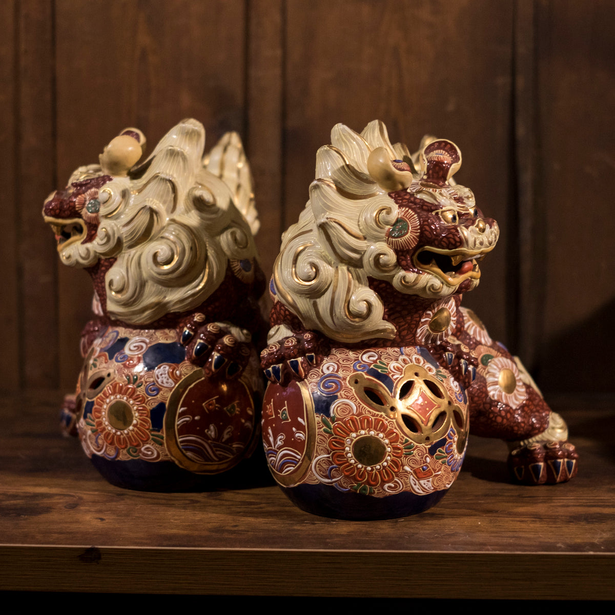 Vintage Japanese Kutani Shishi Guardian Lion Pair with Pierced Brocade Balls | Red Gold Moriage Ceramic Foo Dogs