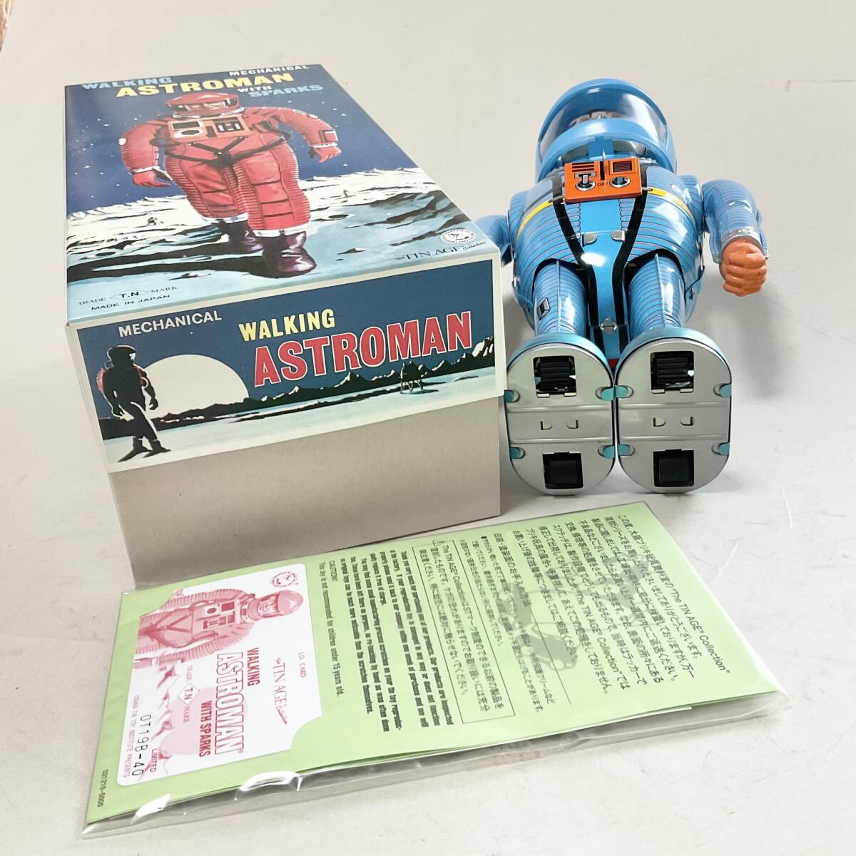 Astroman Blue Walking Mechanical Tin Robot with Sparks Boxed with Papers Space Age Vintage-Style Collectible