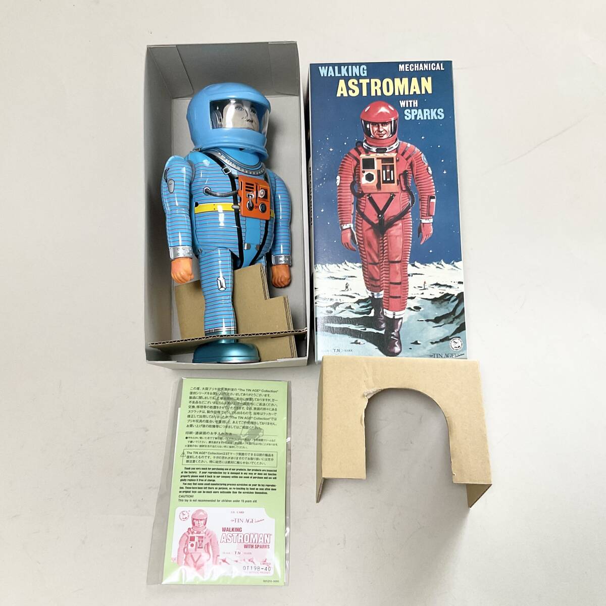 Astroman Blue Walking Mechanical Tin Robot with Sparks Boxed with Papers Space Age Vintage-Style Collectible