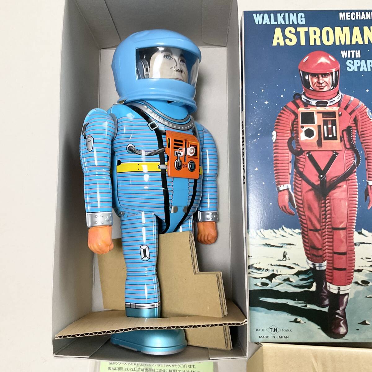 Astroman Blue Walking Mechanical Tin Robot with Sparks Boxed with Papers Space Age Vintage-Style Collectible