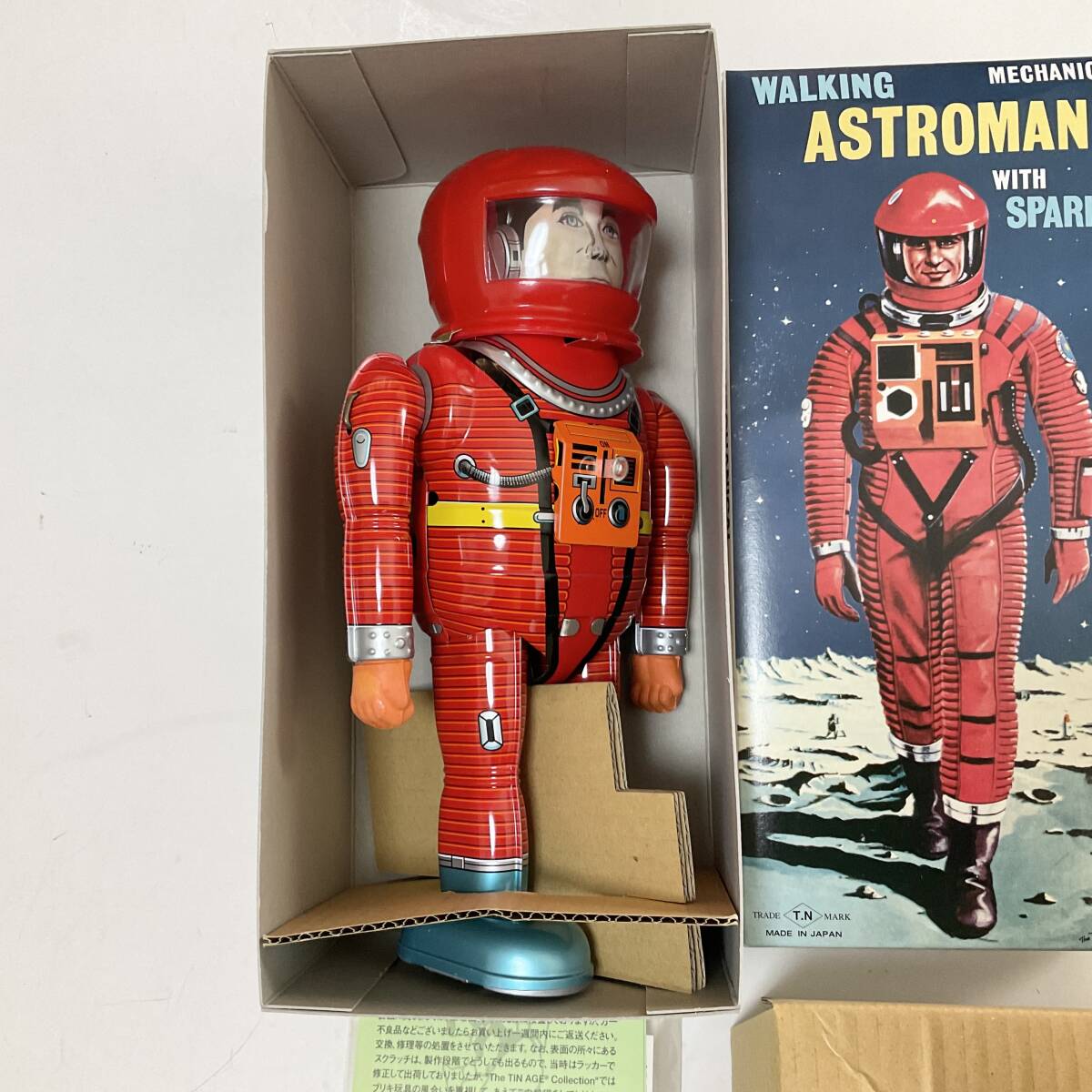 Astroman Red Walking Mechanical Tin Robot with Sparks Boxed with Papers Space Age Vintage-Style Collectible