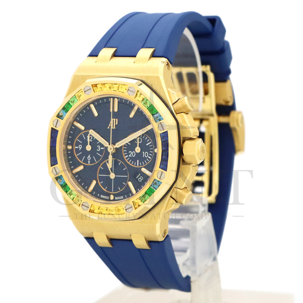 Audemars Piguet Royal Oak Offshore Selfwinding Chronograph Ref. 26236BA.YY.D346CA.01 · 18K Yellow Gold · Baguette Sapphire & Tsavorite Bezel · Blue Lady Tapisserie Dial · 37mm