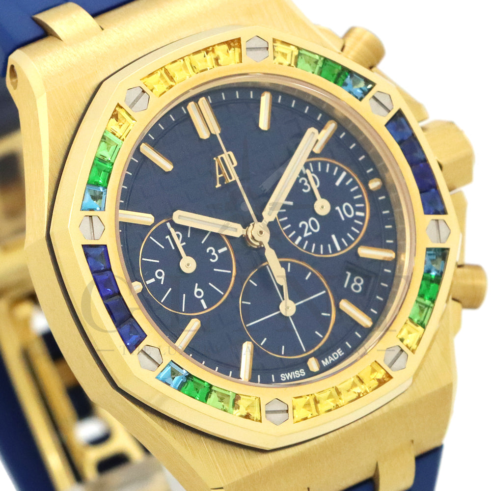 Audemars Piguet Royal Oak Offshore Selfwinding Chronograph Ref. 26236BA.YY.D346CA.01 · 18K Yellow Gold · Baguette Sapphire & Tsavorite Bezel · Blue Lady Tapisserie Dial · 37mm