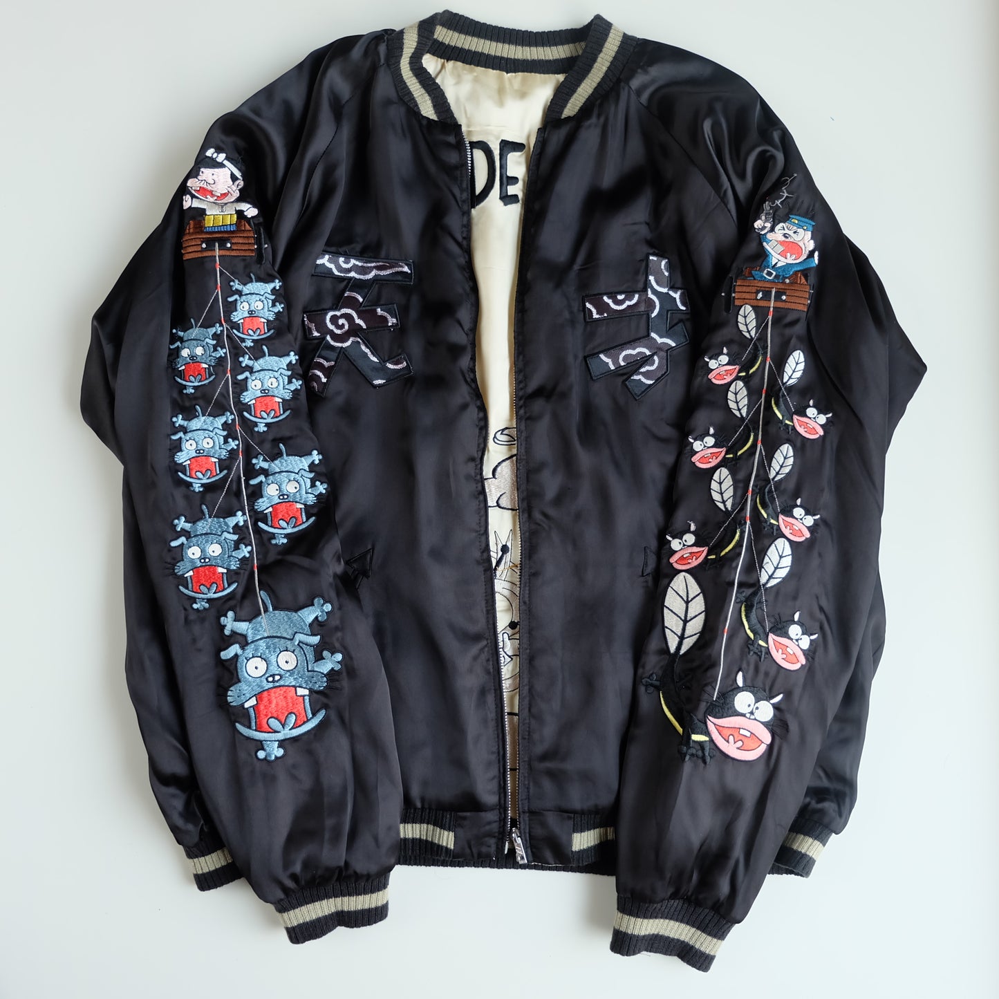The Iconic Juvenile Delinquent x Tensai Bakabon Sukajan Jacket Reversible Korede Iinoda Embroidered Anime Souvenir Bomber Black Ivory