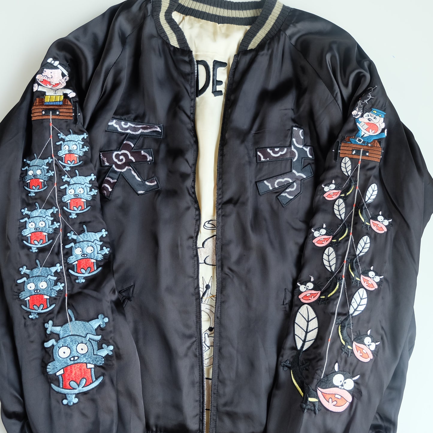 The Iconic Juvenile Delinquent x Tensai Bakabon Sukajan Jacket Reversible Korede Iinoda Embroidered Anime Souvenir Bomber Black Ivory