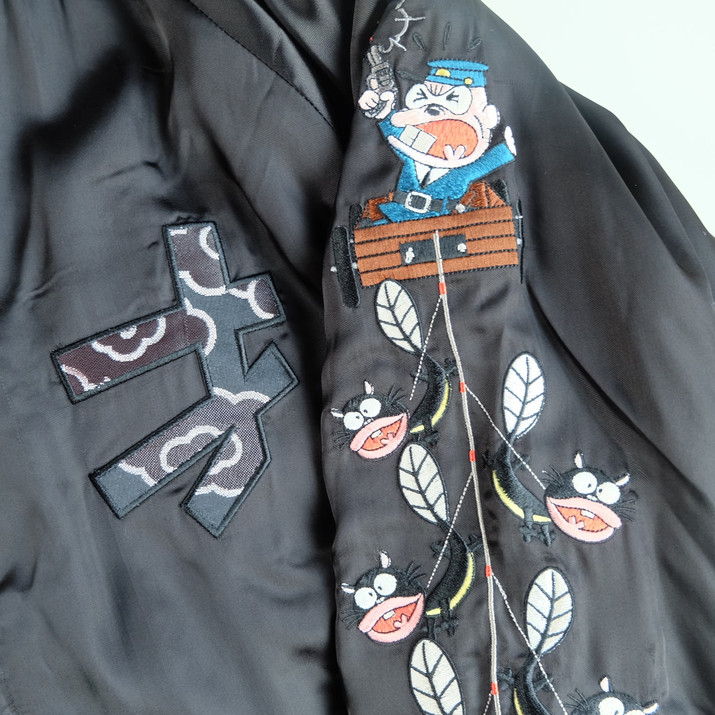 The Iconic Juvenile Delinquent x Tensai Bakabon Sukajan Jacket Reversible Korede Iinoda Embroidered Anime Souvenir Bomber Black Ivory