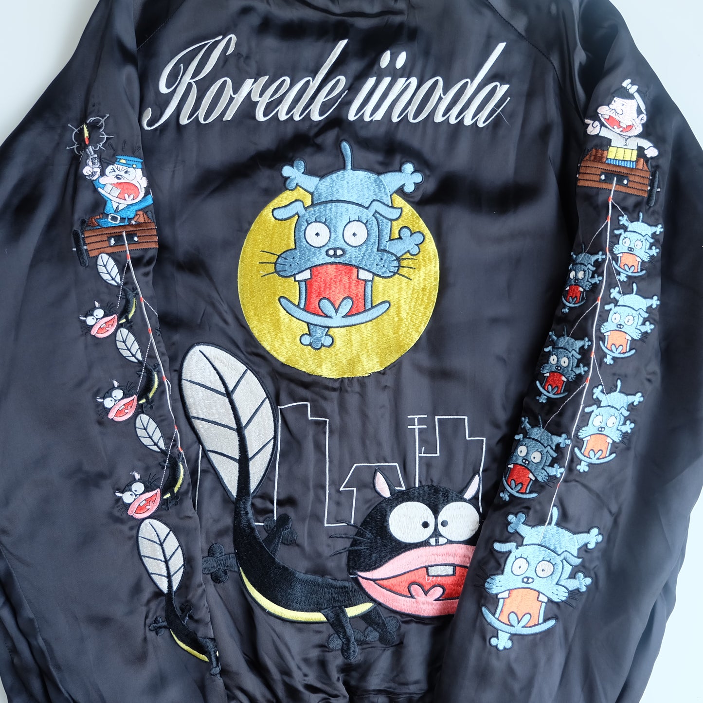 The Iconic Juvenile Delinquent x Tensai Bakabon Sukajan Jacket Reversible Korede Iinoda Embroidered Anime Souvenir Bomber Black Ivory
