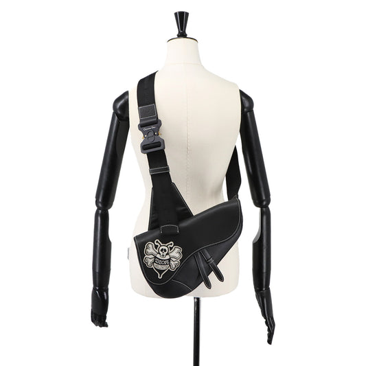 Dior × Shawn Stussy black leather skull Saddle bag