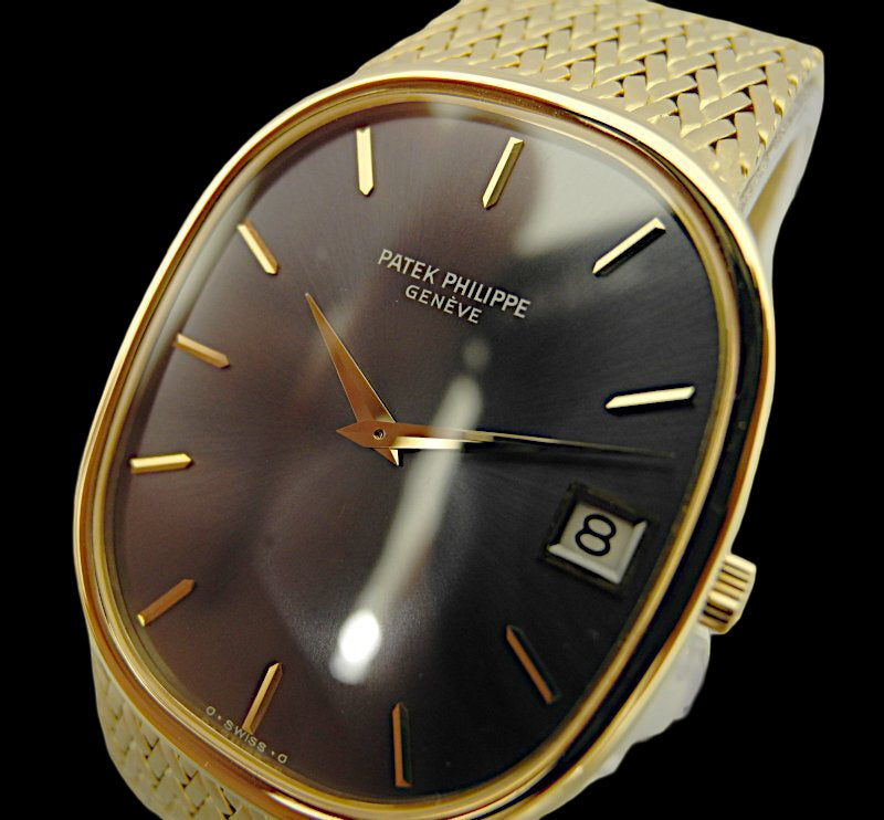 Patek Philippe Golden Ellipse Jumbo 3605/1J · 18K Gold Integrated Bracelet · Automatic Cal.28-255 · Blue-Grey Sunburst Dial · 1970s Vintage