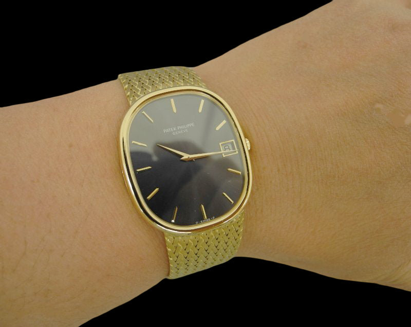 Patek Philippe Golden Ellipse Jumbo 3605/1J · 18K Gold Integrated Bracelet · Automatic Cal.28-255 · Blue-Grey Sunburst Dial · 1970s Vintage