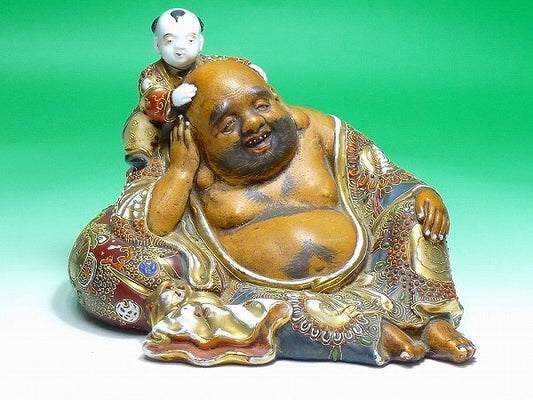Kutani Ware Hotei with Karako Figure | Seven Gods of Fortune | Gilded Polychrome Ceramic Group Sculpture