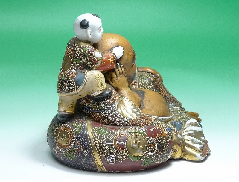 Kutani Ware Hotei with Karako Figure | Seven Gods of Fortune | Gilded Polychrome Ceramic Group Sculpture