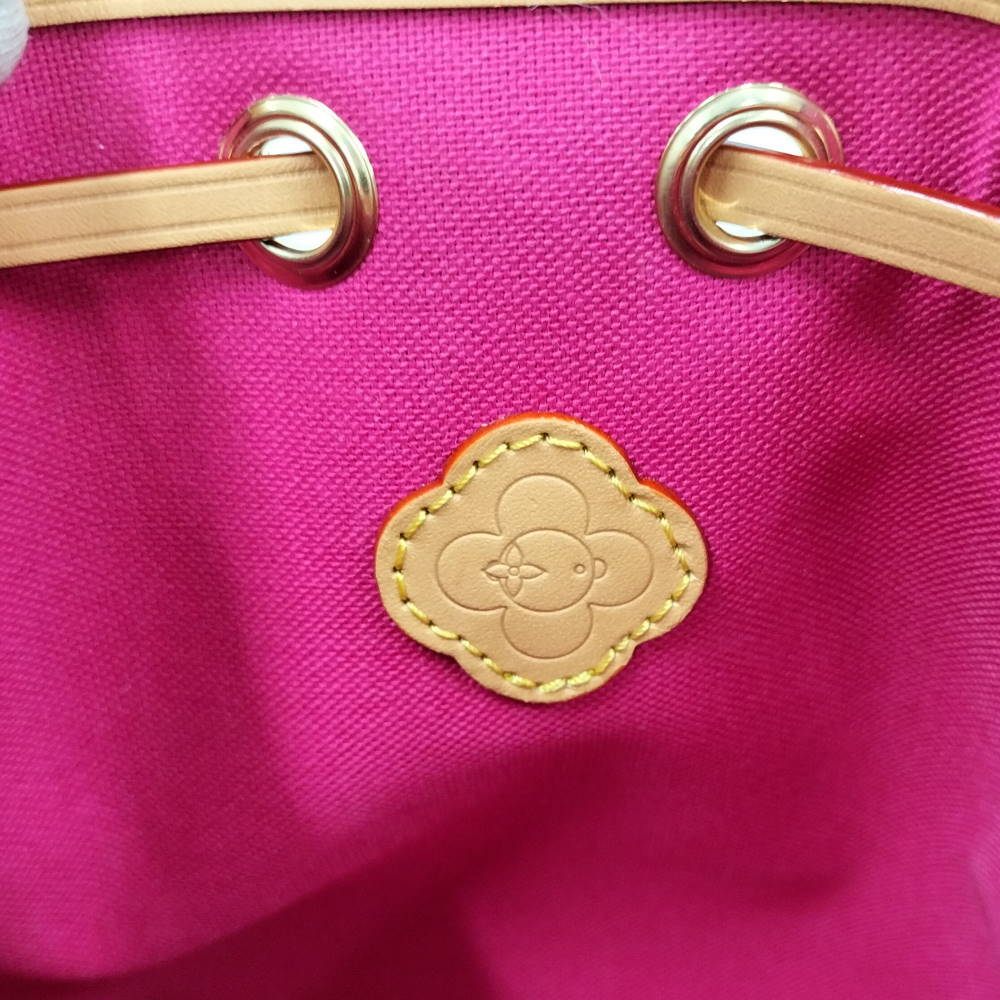 Louis Vuitton Noé-Where Vivienne M15329 Monogram Frozen Orchid Shearling Mini Shoulder Bag