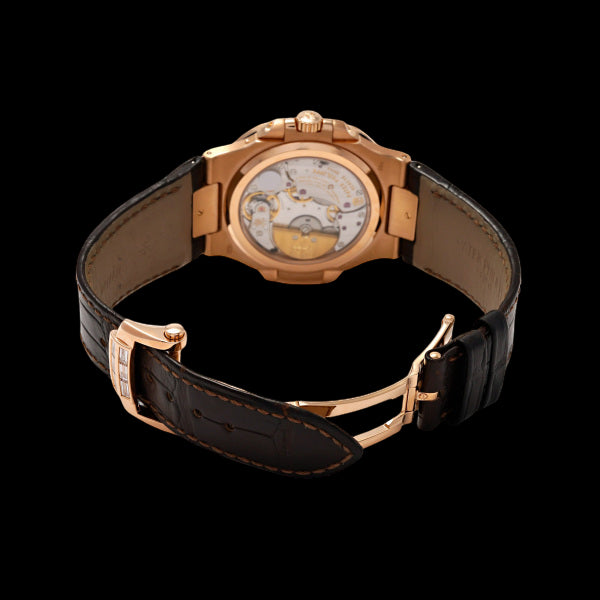 Patek Philippe Nautilus 5724R-001 Rose Gold Baguette Diamond Bezel Dark Brown Embossed Dial Moonphase Power Reserve 40mm