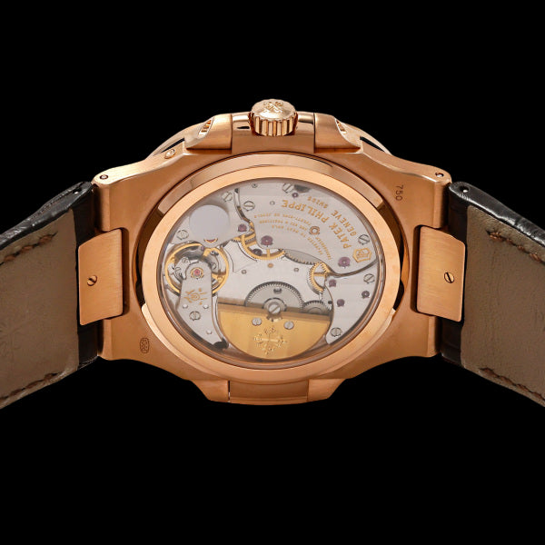 Patek Philippe Nautilus 5724R-001 Rose Gold Baguette Diamond Bezel Dark Brown Embossed Dial Moonphase Power Reserve 40mm