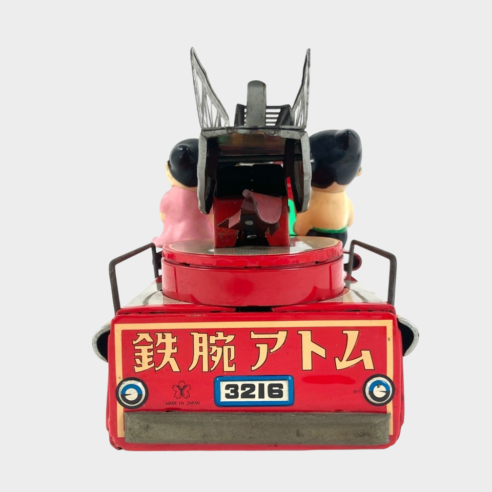 Showa-Era Yonezawa Japanese Tin Fire Ladder Truck with Astro Boy Showa-Era Yonezawa Japanese Tin Fire Ladder Truck with Astro Boy