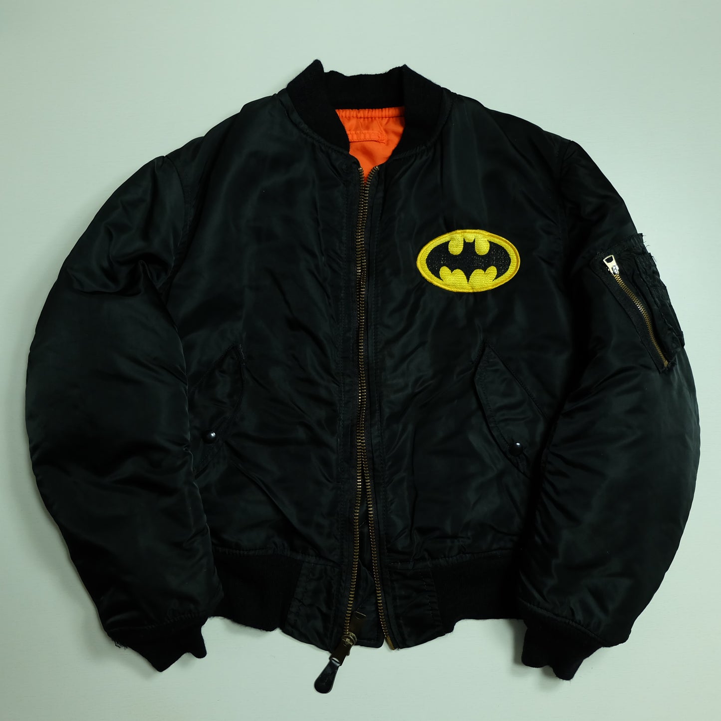 Vintage 1990s Alpha Industries Batman Logo MA-1 Bomber Jacket Medium USA Made Reversible Black Orange Flight Jacket