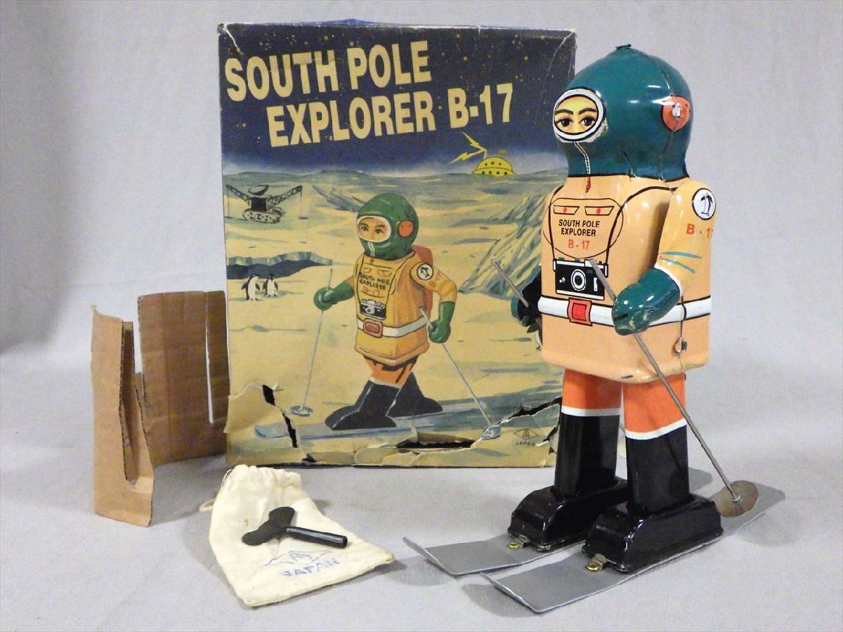 TET Japan / Naito-Shoten-Associated “South Pole Explorer B-17” · Clockwork Skiing Tin Explorer · Original Box, Skis, Poles & Accessories · Japan, circa 1955