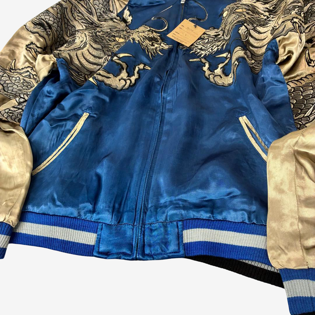 Rare blue and champagne gold Hanatabi Gakudan sukajan jacket featuring full-wrap twin dragon embroidery and original tags attached.