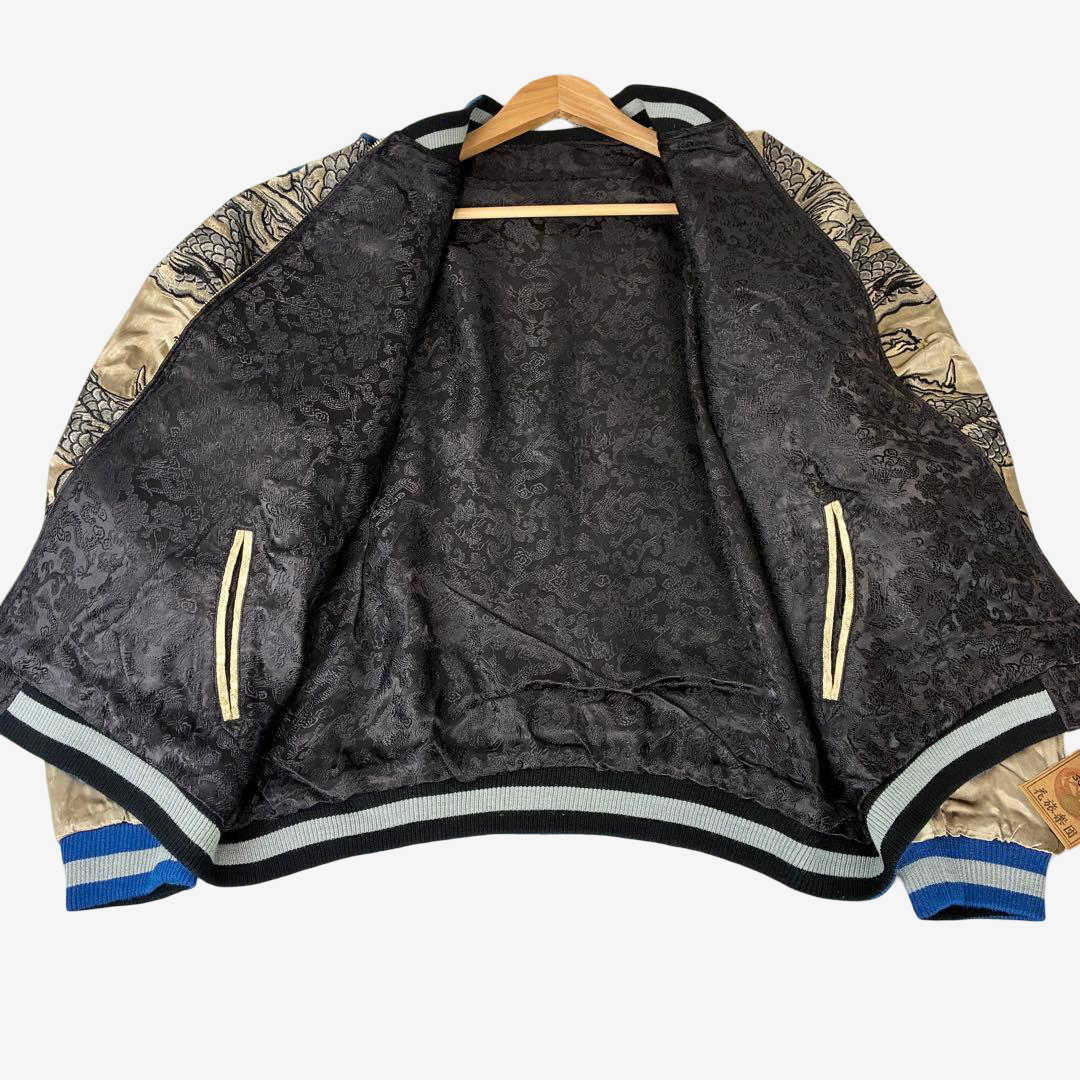 Rare Hanatabi Gakudan reversible Sukajan jacket interior. Black brocade lining with gold trim and twin dragon embroidered champagne gold sleeves.