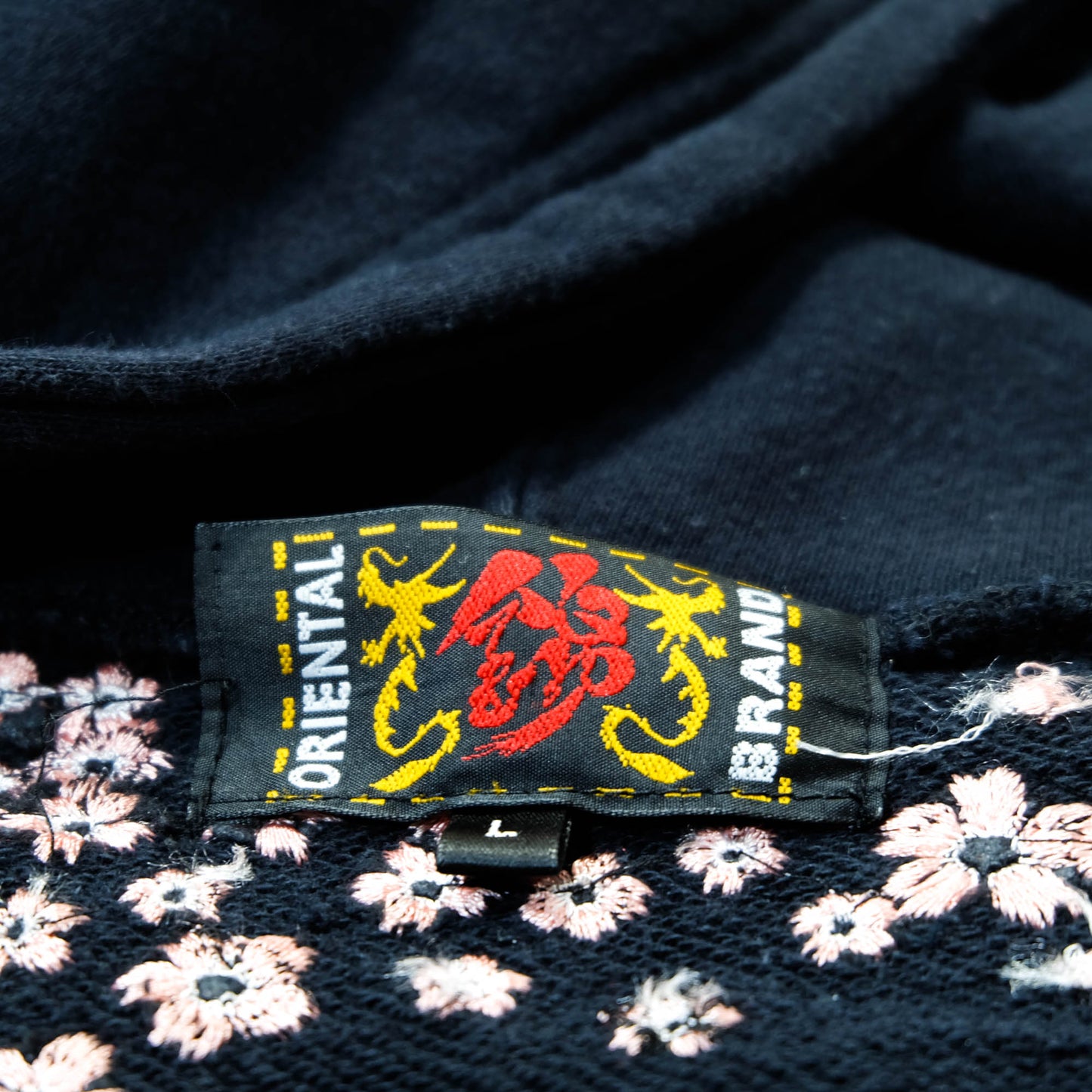 Elegant Japanese Streetwear Hoodie with Cascading Sakura Branch Embroidery, Falling Petals and Wagara-Inspired Floral Art