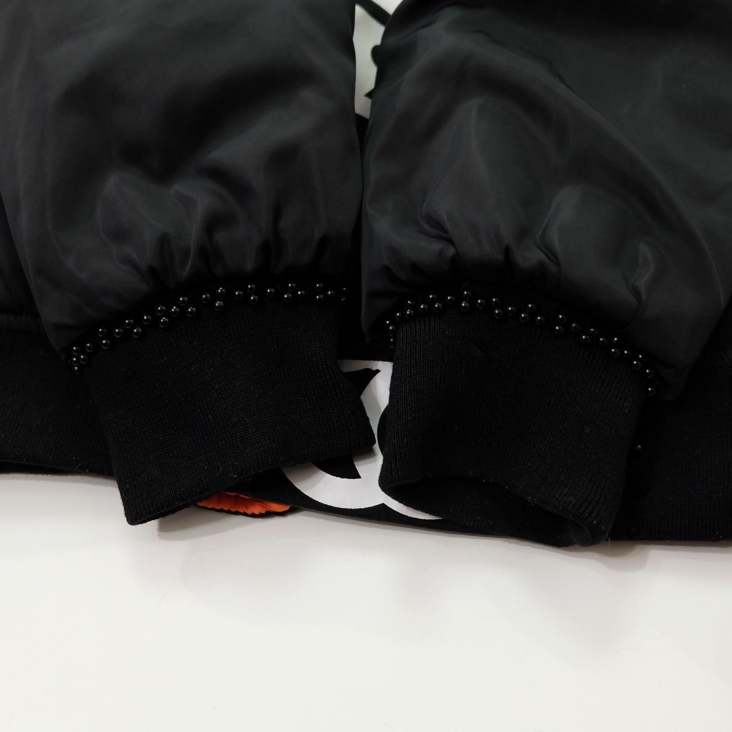 CHANEL Rue Paris Big Logo Black Bomber Jacket | Orange Quilted Lining | Size M | Rare 1990s-Style Luxury Streetwear