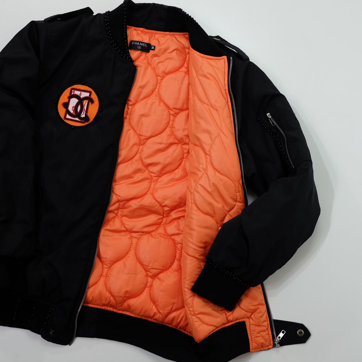 CHANEL Rue Paris Big Logo Black Bomber Jacket | Orange Quilted Lining | Size M | Rare 1990s-Style Luxury Streetwear