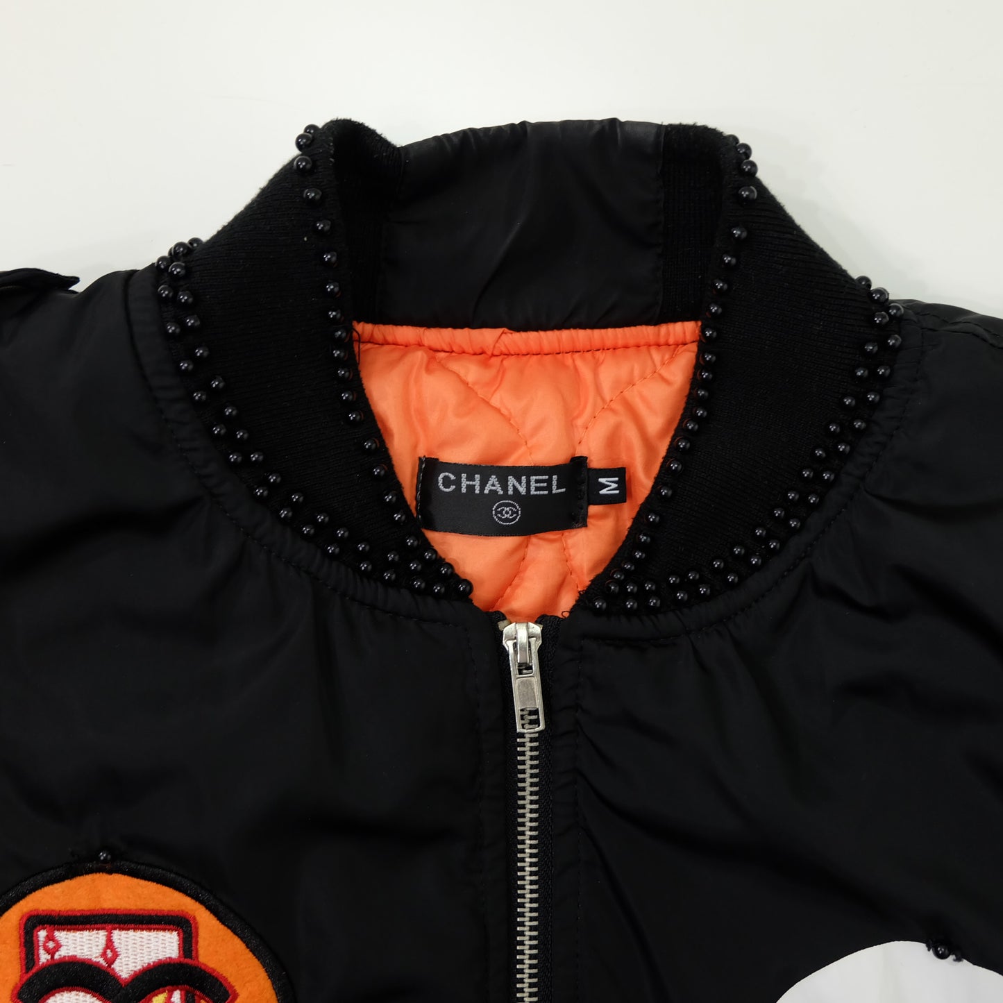 CHANEL Rue Paris Big Logo Black Bomber Jacket | Orange Quilted Lining | Size M | Rare 1990s-Style Luxury Streetwear
