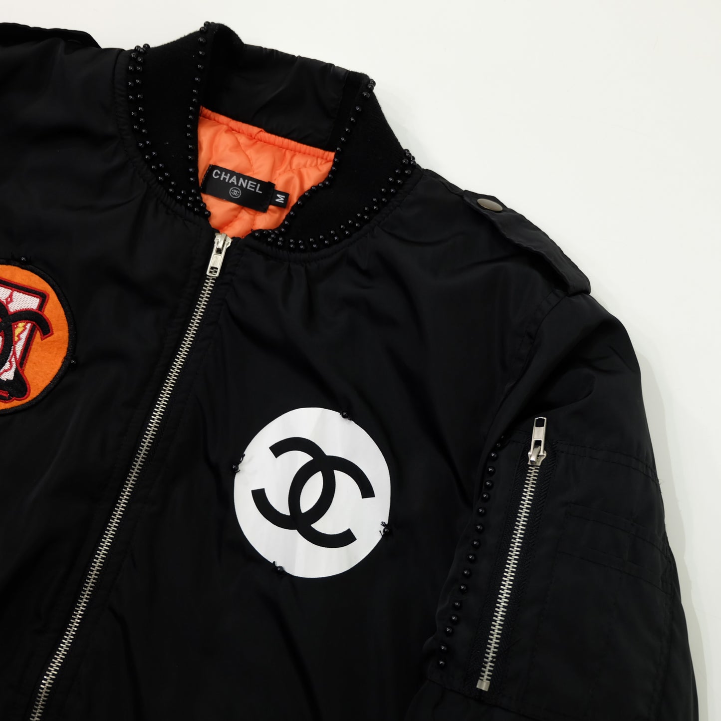 CHANEL Rue Paris Big Logo Black Bomber Jacket | Orange Quilted Lining | Size M | Rare 1990s-Style Luxury Streetwear