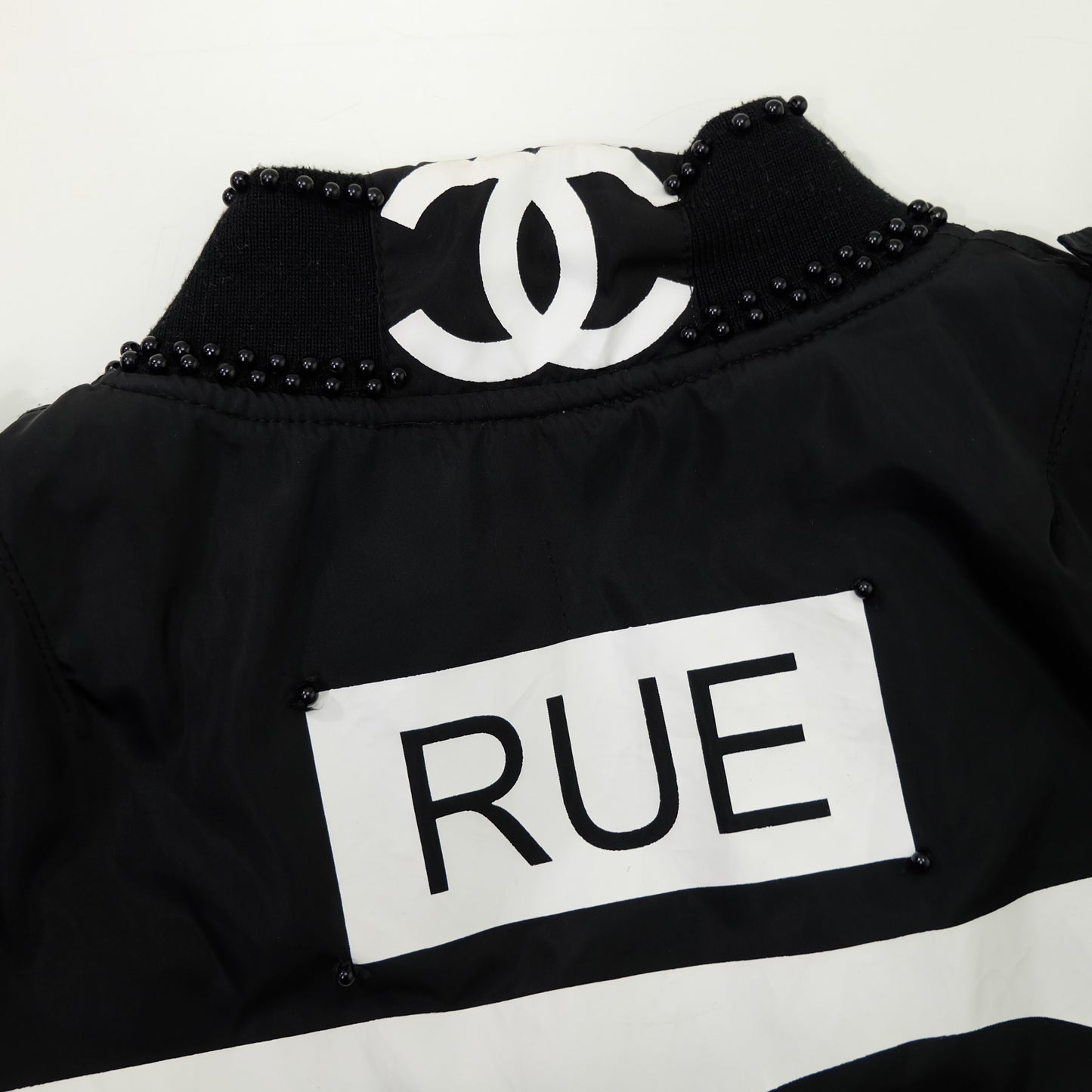 CHANEL Rue Paris Big Logo Black Bomber Jacket | Orange Quilted Lining | Size M | Rare 1990s-Style Luxury Streetwear