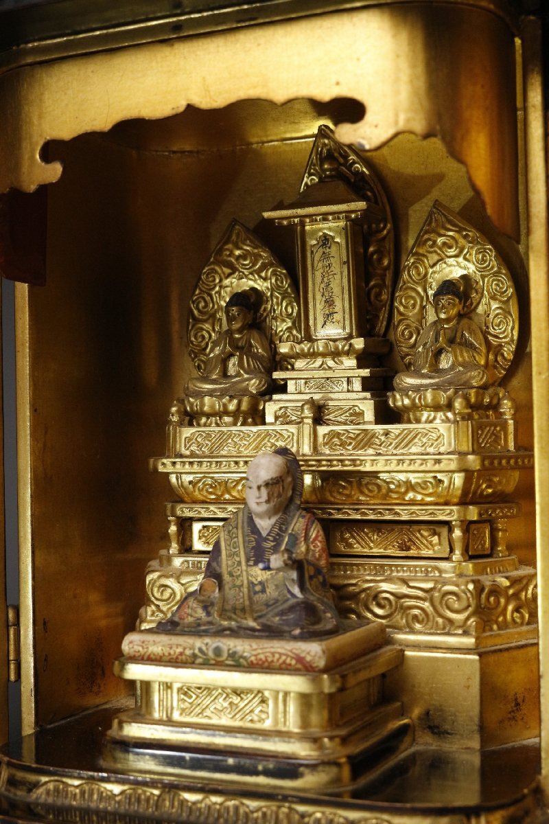 Nichiren Shonin Triad Zushi Shrine — Polychrome Wooden Founder Icon with Gilt Interior Miniature Altar, Fine Metal Fittings and Aged Black Lacquer Case (Approx. 23.5 cm Tall)