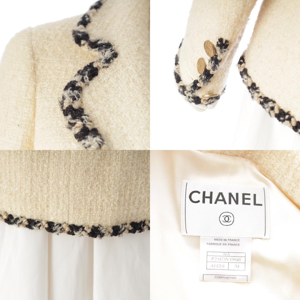 Chanel Autumn 2006 Ivory Tweed Jacket, Four Pockets, Black Braid Trim, CC Sunburst Buttons, Size 34, view 8