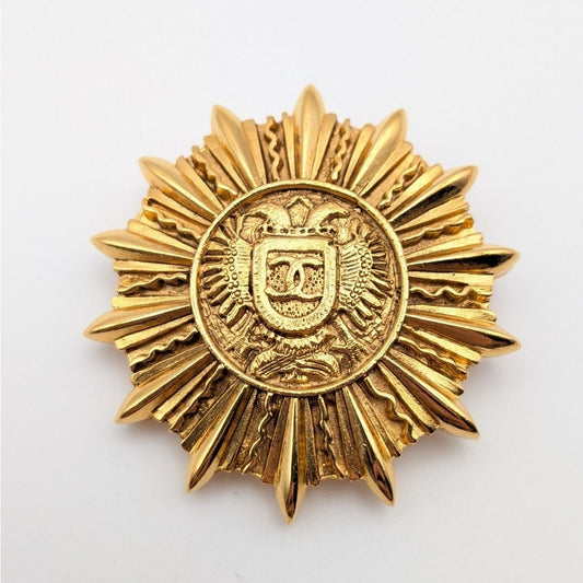 Chanel Sunburst Emblem Brooch with Crest, Gilt Metal, Early Vintage, view 1