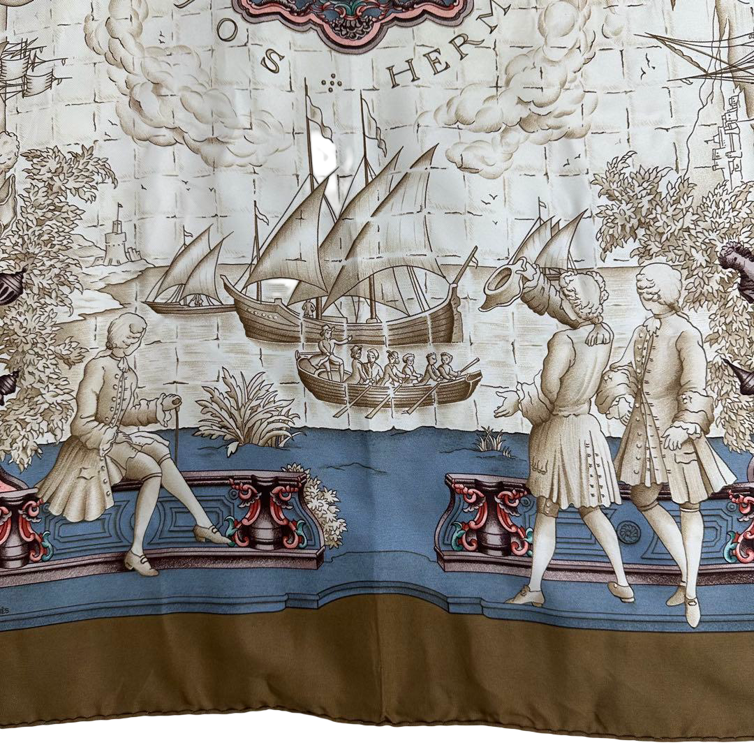 Hermès Carré 90 silk twill scarf, Age of Exploration, bronze border – galleon and seated figures detail