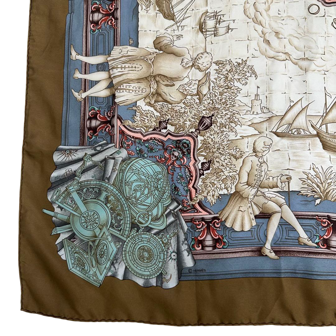 Hermès Carré 90 silk twill scarf, Age of Exploration, bronze border – corner with navigational instruments and sea charts