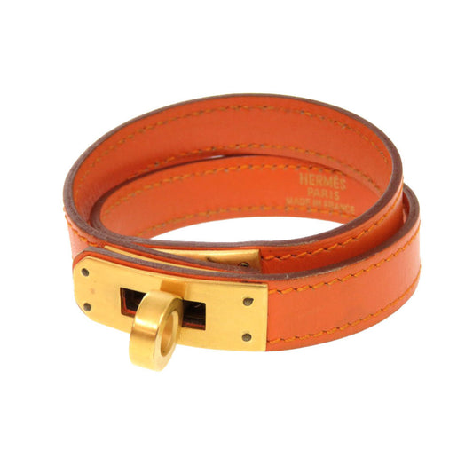 Hermès Kelly Double Tour Bracelet, Orange Swift Leather, Gold Hardware, 2003, view 1