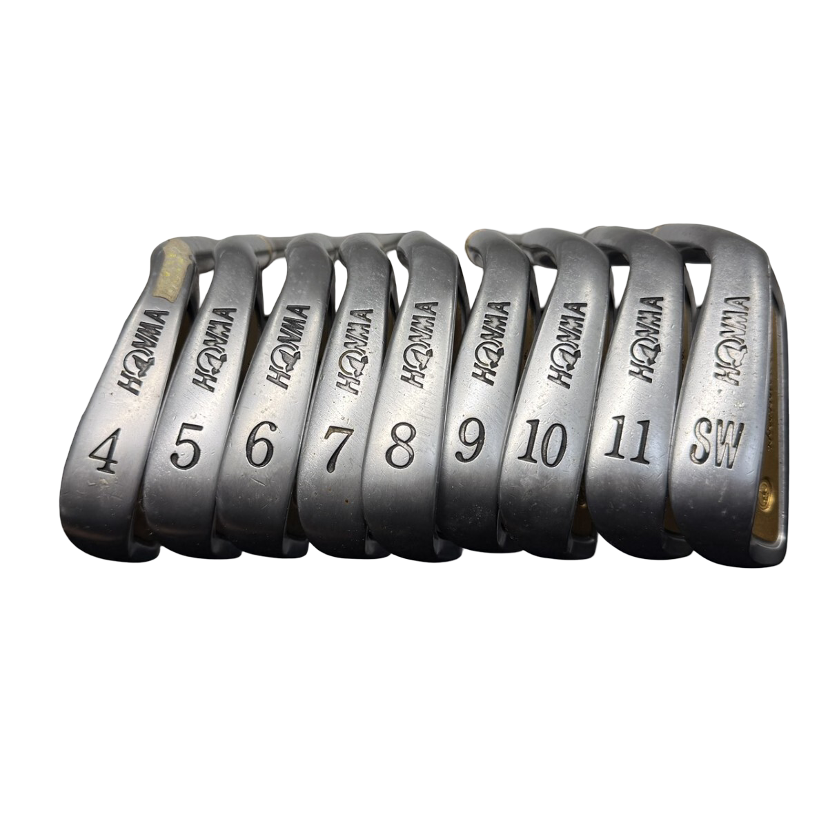 HONMA 24K Gold Coin iron set, 4-Star, 9 clubs 4–11 and SW – soles lined up, numbered 4 to 11 and SW