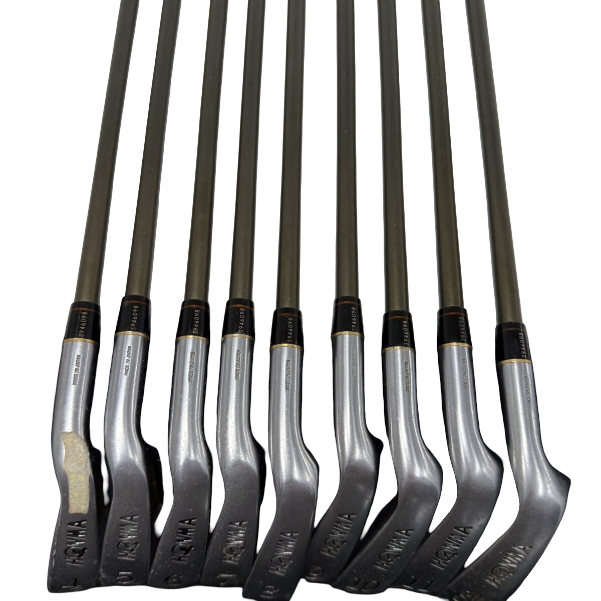 HONMA 24K Gold Coin iron set, 4-Star, 9 clubs 4–11 and SW – set laid flat showing shaft lengths and grips