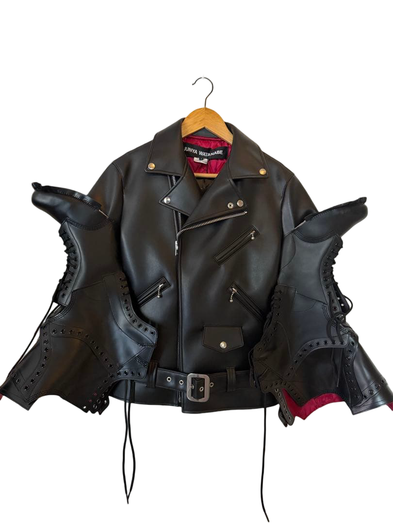 Junya Watanabe × Dr. Martens faux leather rider jacket JP-J102, black – front view on hanger, boot-shaped sleeves with laces