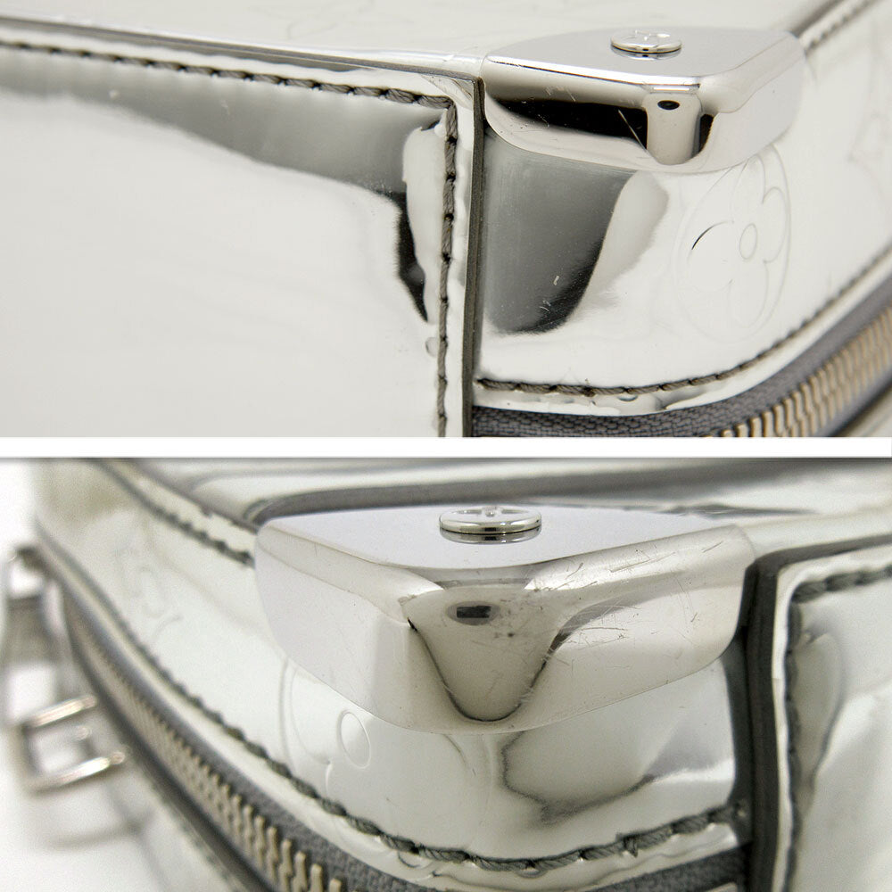Louis Vuitton Soft Trunk M45885, Chrome Silver Mirror Monogram with Vachetta Strap, Made in Italy, photograph 6 of 10