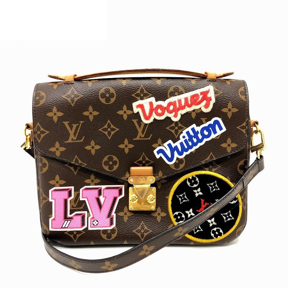Louis Vuitton Pochette Métis MM Patches Edition, Monogram with Voguez Vuitton, LV and Heart Patches, 2018, view 1
