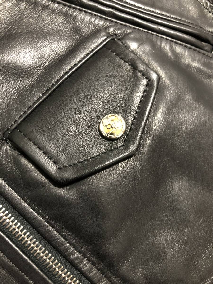 Mastermind Japan crystal skull horsehide single rider jacket, 2011 SS Radiance – flap pocket with engraved snap button