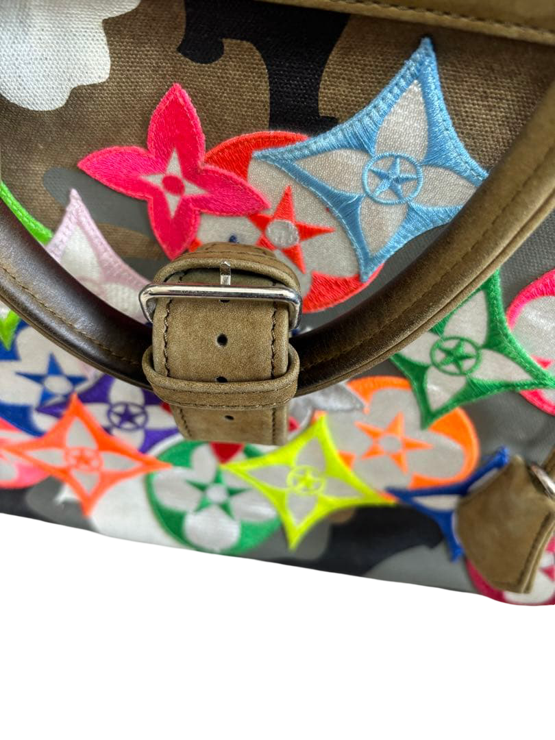 READYMADE Gym Bag camouflage canvas tote with multicolour flower patches – strap buckle over the flower patches