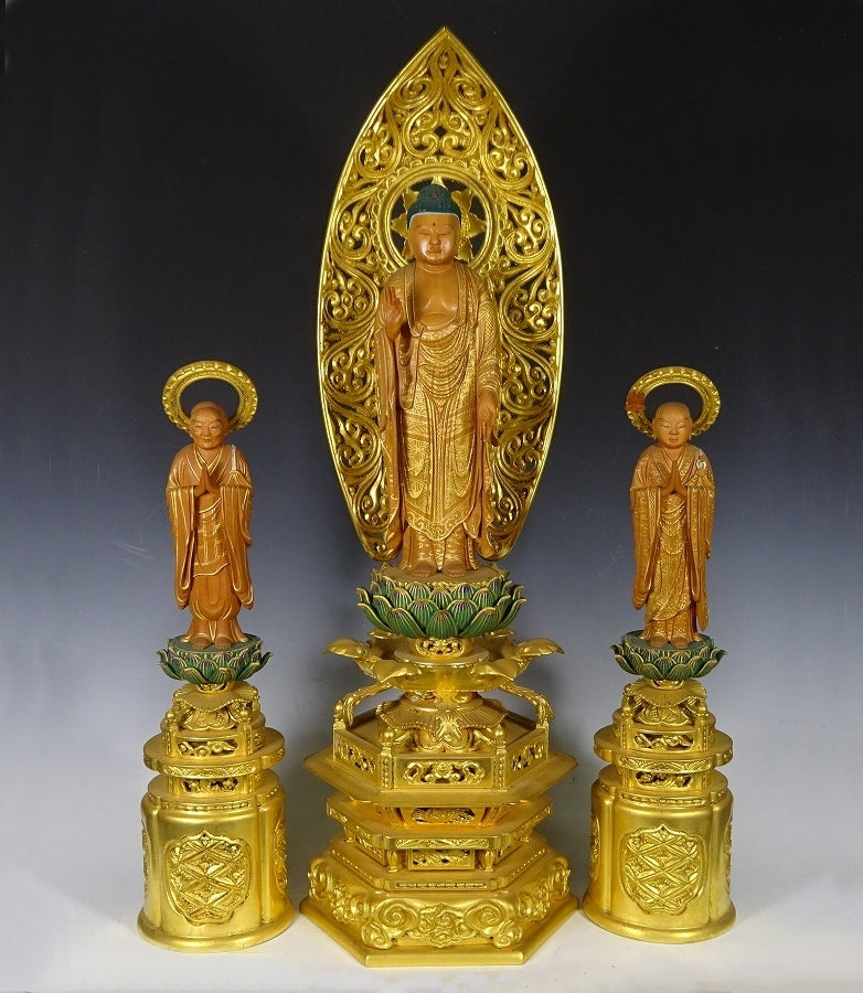 Jodo Shinshu Amida Triad (Standing Amida + Zendo Shonin + Hosen Shonin) — Carved Wood with Gilt Surfaces and Lotus Bases, Large Central Icon (47 cm) with Two 30 cm Attendants