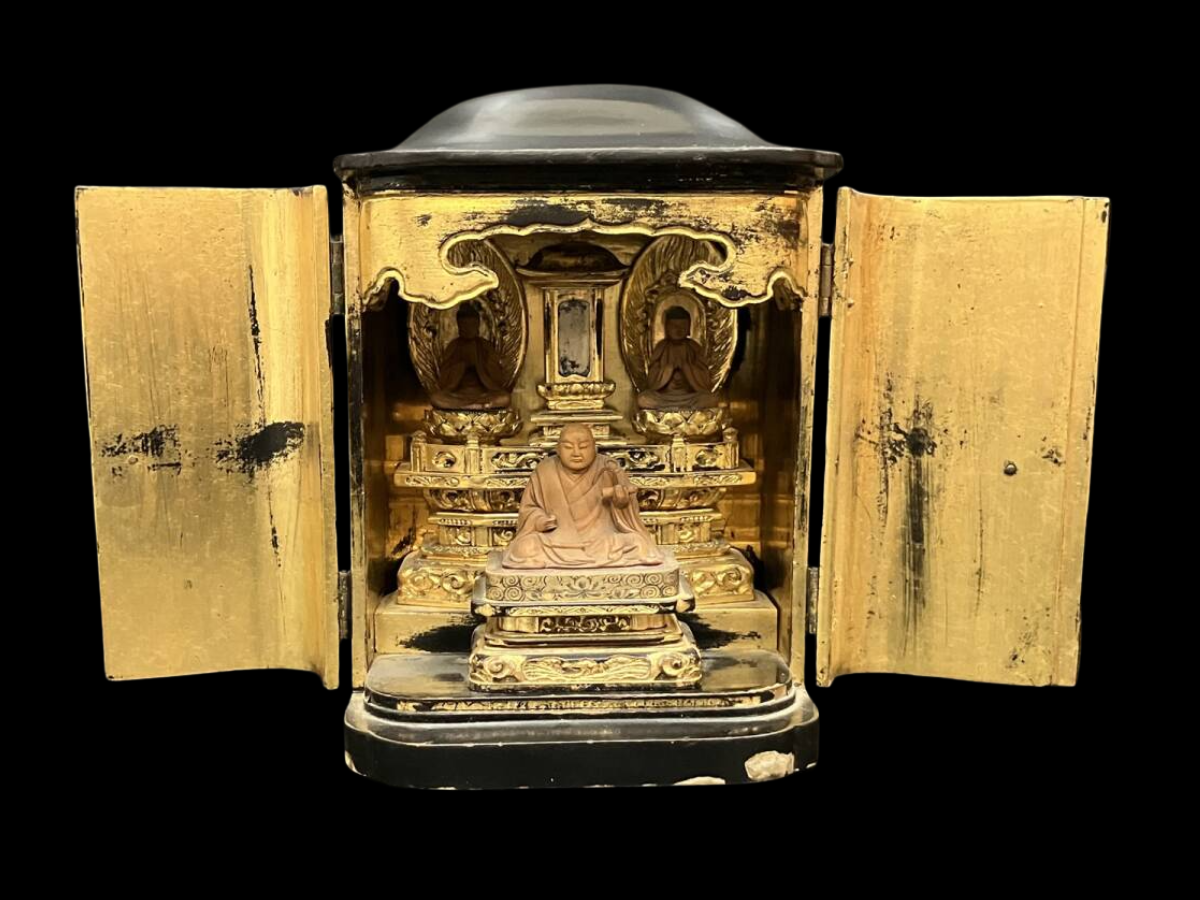 Edo Period Giltwood Portable Zushi Shrine — Nichiren Shonin with Triratna (Sanbōson), Black Lacquer & Gold, Japan