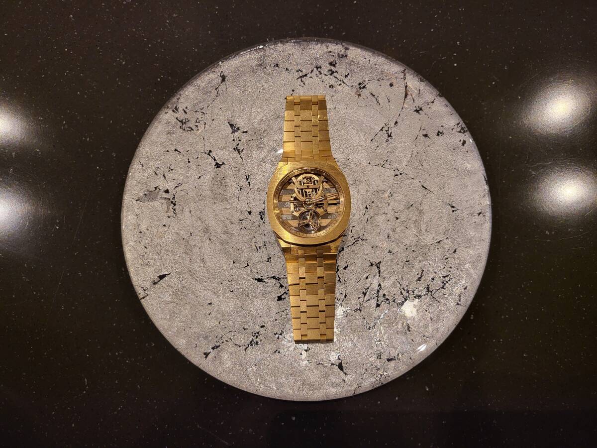 Gucci 25H Skeleton Flying Tourbillon · 18K Yellow Gold · Integrated Gold Bracelet · Cal. GG727.25.TS