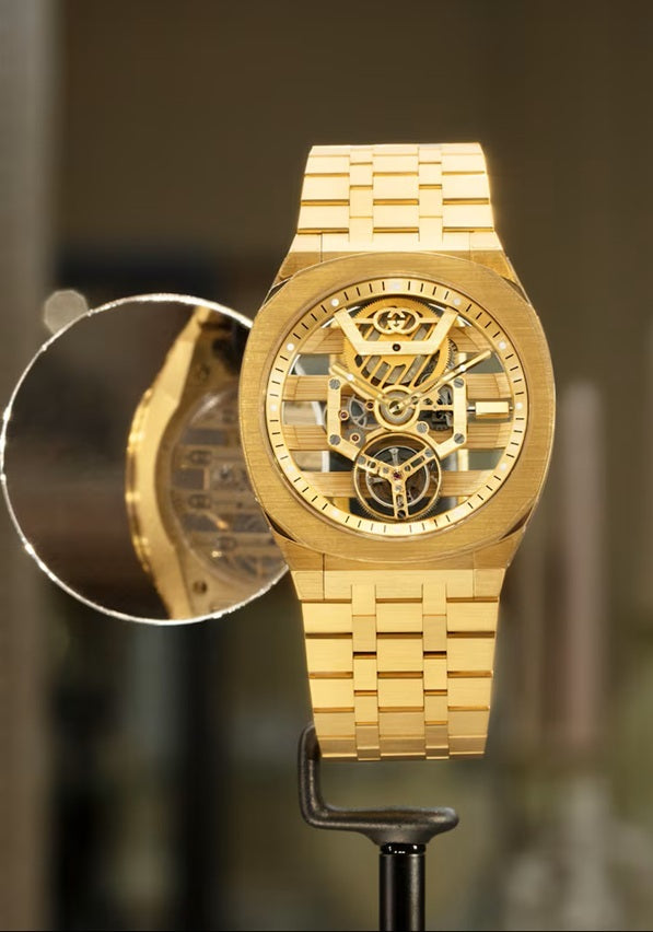 Gucci 25H Skeleton Flying Tourbillon · 18K Yellow Gold · Integrated Gold Bracelet · Cal. GG727.25.TS