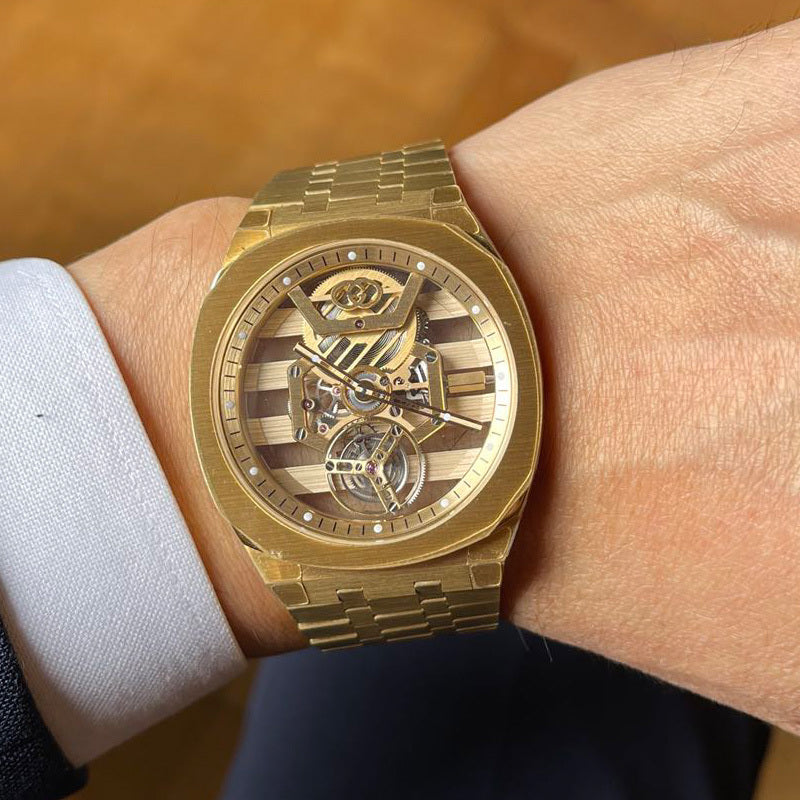 Gucci 25H Skeleton Flying Tourbillon · 18K Yellow Gold · Integrated Gold Bracelet · Cal. GG727.25.TS